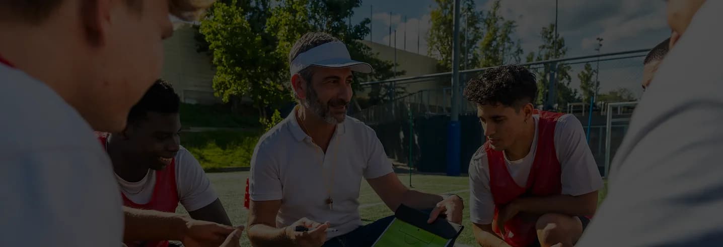 Young athlete training with coach