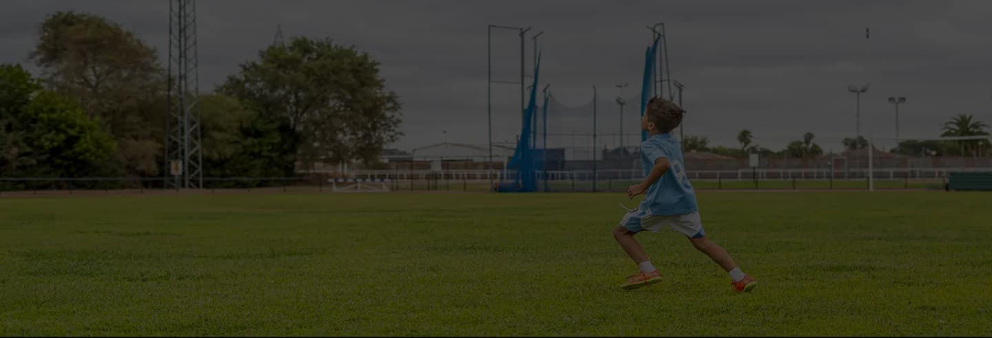 Young athlete training with coach