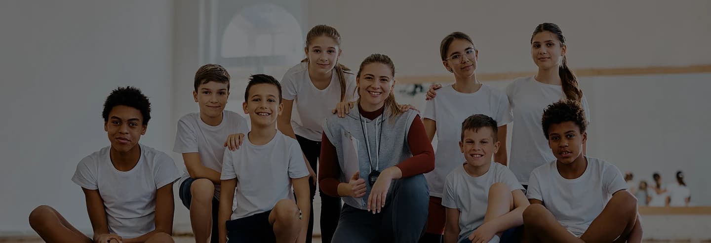 Young athlete training with coach