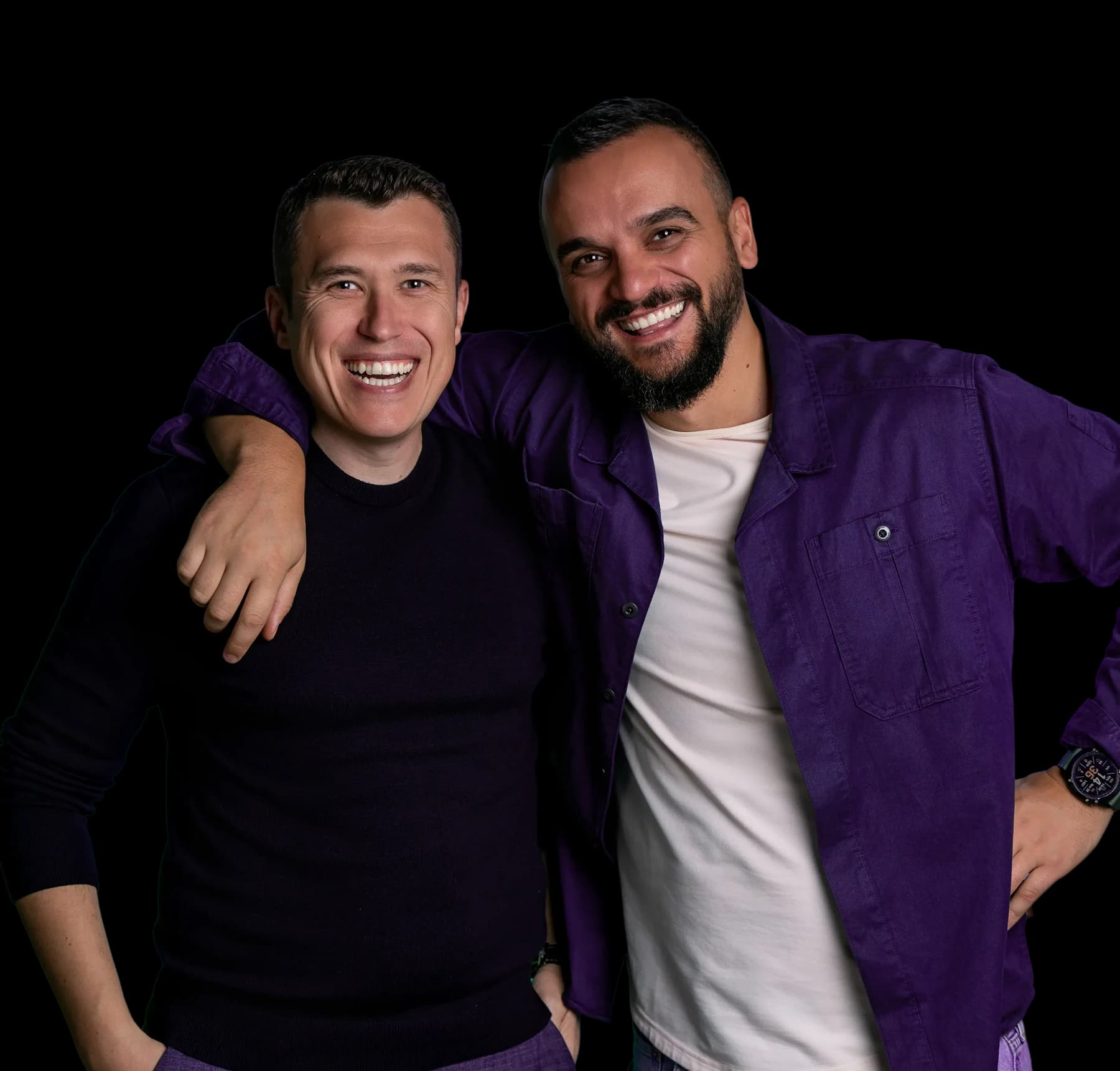 Two people smiling together