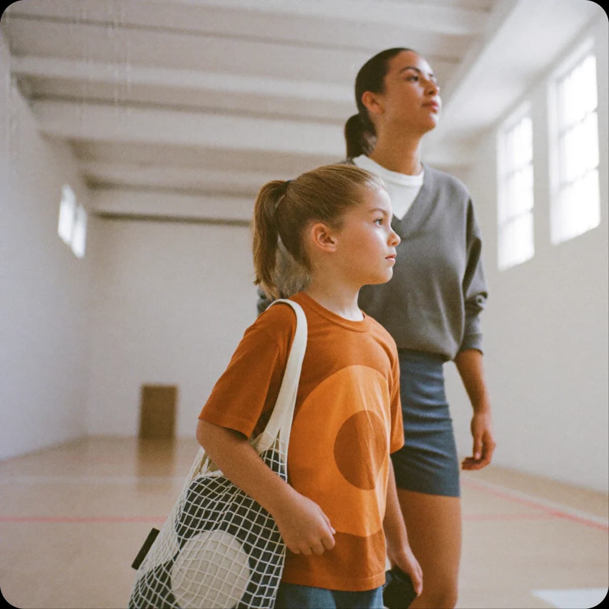 Parent browsing coach profiles on their phone