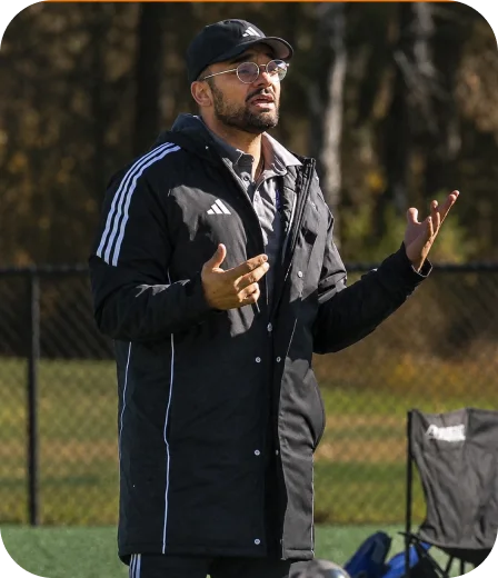 Coach leading a team practice